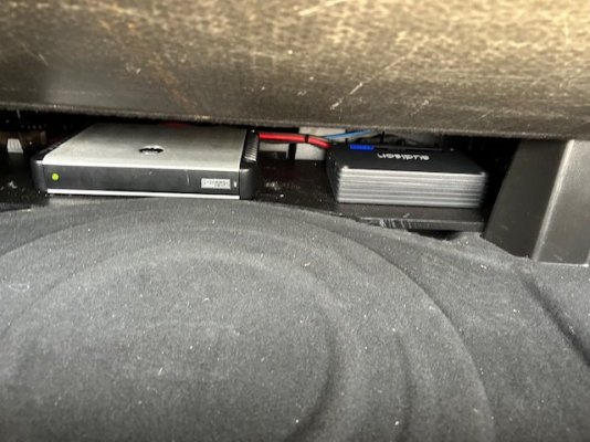 components install space under spare tire hatch under back seat.jpeg